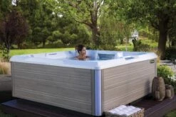Hot Spring Beam - 4 Person Hot Tub 12 Hot Spring Beam - 4 Person Hot Tub -Bathtub Spa Store hotspring limelight 2018 beam alpinewhite coastal gray lifestyle womanalone green backyard 01