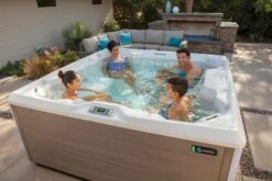 Hot Spring Pulse - 7 Person Hot Tub 14 Hot Spring Pulse - 7 Person Hot Tub -Bathtub Spa Store hotspring limelight 2018 pulse alpinewhite coastal gray lifestyle family 02